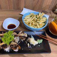 Sushi is great! Can skip the fries(not hot) and drink is pricey.  at Lucky Cat Cafe in Northeast Singapore