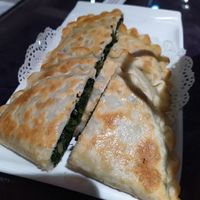 Kind of like a spinach pastie. Very generous portion for a side-dish. Be prepared to take away leftovers! at Fú Huì Lián Chéng 福慧莲城 - Longfeng Temple in Shenyang