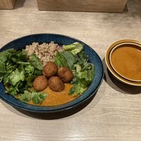 Tomato curry with coriander and falafel toppings and extra rue   at RUCY+R 横浜ジョイナス店 in Yokohama
