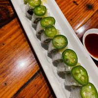 VG Beehive Roll $7.75 INSIDE: Shishito peppers, avocado, gobo carrot, cucumber &asparagus TOP: jalapenos, lemons slices w/ Yuzu citrus sauce at Sushi Deli 3 in San Diego