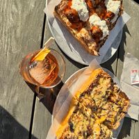 New Maps (Buffalo bleu cheese fried chkn) and Philly Cheesesteak pizza (with Buddy’s steak, peppers, onions, cheese sauce) and an apple old fashioned from Paydirt next door 🤤  at Boxcar Pizza in Portland
