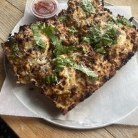 Bianca Pizza with side of red saucee  at Boxcar Pizza in Portland