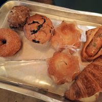 Bought a vegan donut and chocolate chip scone (top/bottom left) and non-vegan items for family (right). The blueberry muffin (center) is also vegan. at Morethan Bakery in Tokyo
