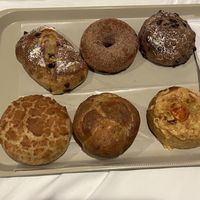  top half vegan: chocolate and orange bun, cinnamon donut and blueberry bun, bottom half vegetarian   at Morethan Bakery in Tokyo