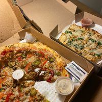 Pizza and cheesy bread takeout at Hoboken Pie in Austin
