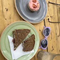 Tomato and hummus Stullen with the lemon and strawberry cupcake and a chai tea  at Roasted Kaffeebar in Dusseldorf