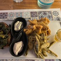 Antipasto misto con salvia e carciofi fritti, due differenti maionesi e un crostino con salsiccia vegan  at Status Quo in Rome