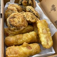 Vegan battered sausages and mushrooms  at Lewis's Fish & Grill in Maidstone