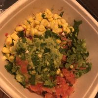 Corn , lettuce guacamole, pico de gallo , cilantro  at Moho Mexican Grill in Bayside