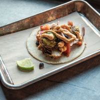 Brussels Sprout Taco-Fried brussels with onion black beans, tomato and cashew crema. at Luna's Tacos & Tequila in Greeley