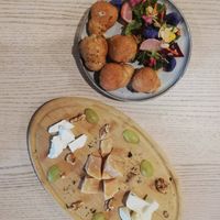 This is a vegetarian option on the menu, cheese plate & some savory snacks. at The Garden Cafe & Restaurant in Budapest