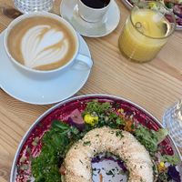 Pesto Simit vegan and Oatmilk Latte  at The Garden Cafe & Restaurant in Budapest