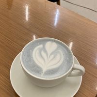 Butterfly pea oat latte  at The Garden Cafe & Restaurant in Budapest