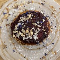Pancakes with fruit jam  at The Garden Cafe & Restaurant in Budapest