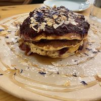 Pancakes with fruit jam  at The Garden Cafe & Restaurant in Budapest