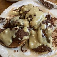 Belgian dark chocolate pancakes plus added pistachio cream, so good!!!  at The Garden Cafe & Restaurant in Budapest