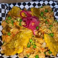 Paella de carne con tostones  at 100% HP in San Juan