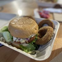 The chicken sandwich with onion rings   at 100% HP in San Juan