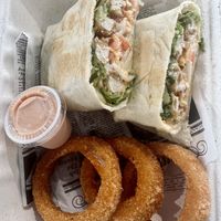 Burrito with onion rings. Tasty but wasn’t too fresh  at 100% HP in San Juan