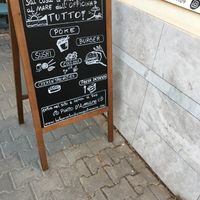 Sign at entrance  at KLIKKEAT in Carrara