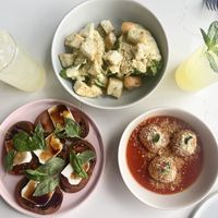 Caprese, Caesar salad, and aracini   at Sestina - Culver City in Culver City