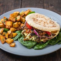 Kebab with caramelized mushrooms, peppers and cabbage + sauces at Hrana Pământului in Timisoara