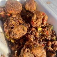 Jerk bowl with crab cakes  at Vegan Time Cafe in Stone Mountain