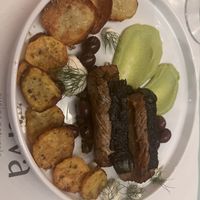 Tofu bio Otani di mare al cartoccio con patate alla greca e salsa di piselli  at Nativa in Rome