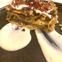 Lasagna with artichokes, mint besciamella, fried capers, lemon cream and dried tomatoes  at Nativa in Rome