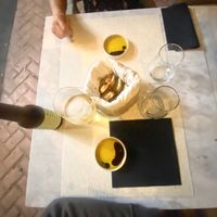 Complementary raisin bread and oil at Hectors Kitchen in Punta De Mita