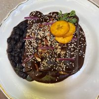 Plantain enchiladas with mole at La Cabra Iluminada in San Miguel De Allende