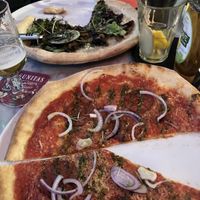 Truffle pizza in the back, don’t remember the name of mine  at Vegan Pizza Bar in Rotterdam