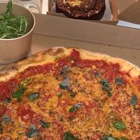 The classic Margherita and their chocolate pie at Vegan Pizza Bar in Rotterdam