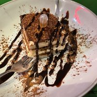 Tiramisu with a shot of amaretto in a pipette!   at Vegan Pizza Bar in Rotterdam