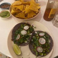 Blue corn tortilla with a proper serving of cilantro and onion   at High House in Seoul
