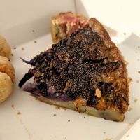 thick farinata - frittata hybrid, here's made with diff beans and cavolo at La Schiscetteria in Milan