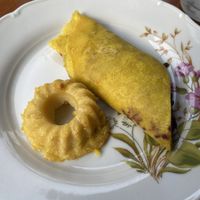 Chickpea cake and crêpe with fermented cabbage  at La Schiscetteria in Milan