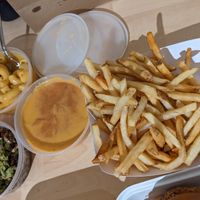 Cheesy fries and vegan mac at Meta Burger in Edgewater