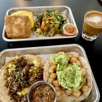 Vegan breakfast tacos and sandwich with JUST egg and Beyond sausage.  at Tellus Joe in Austin