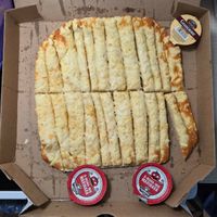 full order vegan stix. comes with 3 sauces of your choice. garlic sauce is vegan (confirmed with manufacturer) at Toppers Pizza in Indianapolis
