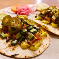 Cactus Tacos - Salt and Pepper fried cactus pads, avocado crema, tomato salsa, vegan cheese.  at Golden State Vegan Sushi in Bangkok