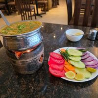 Palak Daal and raw veg. Delicious! at Ashiana Vegetarian Restaurant in Nairobi