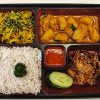 Bento box with some veggies and rice, fake chicken and fish. at Crown Colony Cuisine in Petaling Jaya