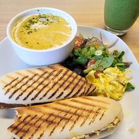Cajun seitan panini with carrot and coriander soup at Vegan Earth in Ayr