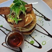 Pancake stack with cheeze, maple syrup, bakon at Vegan Earth in Ayr