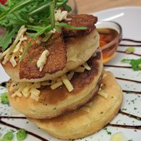 Pancake stack: vegan cheese, bakon, maple syrup at Vegan Earth in Ayr