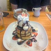 Pancake Stack with chocolate sauce, ice cream, marshmallows, banana & strawberries. (O  at Vegan Earth in Ayr