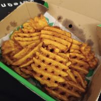 Garlic butter waffle fries at Oowee Vegan in South West London