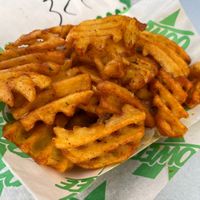 Garlic butter waffle fries  at Oowee Vegan in South West London
