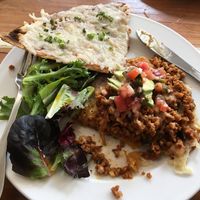 Vegan Rico with vegan cheese bread side  at Carmo in New Orleans